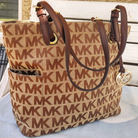 Michael Kors Handbags - Michael Kors Jet Set EastWest Monogram Tote EY1411